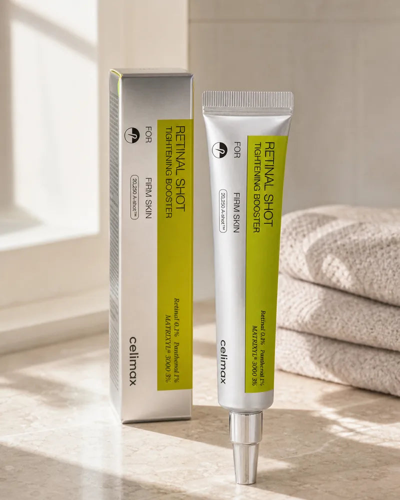Celimax Retinal Shot y su caja sobre una mesa de baño